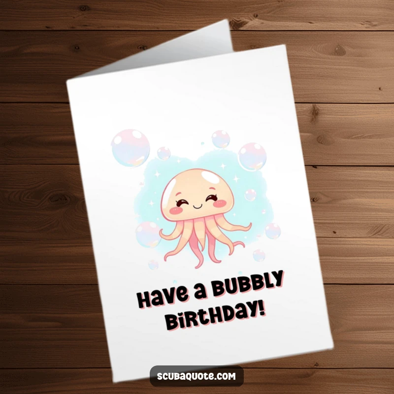 Free Printable Birthday Card featuring a giggling jellyfish floating happily amongst shimmering bubbles, perfect for a fun birthday.