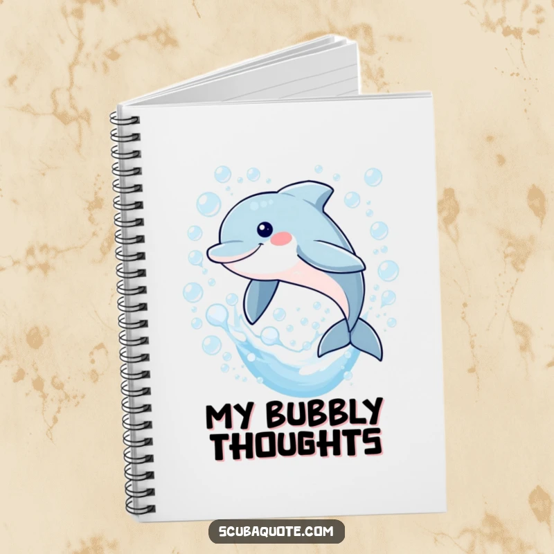 Funny notebook featuring a smiling dolphin leaping through bubbles, ideal for jotting down ideas and capturing aquatic inspirations.