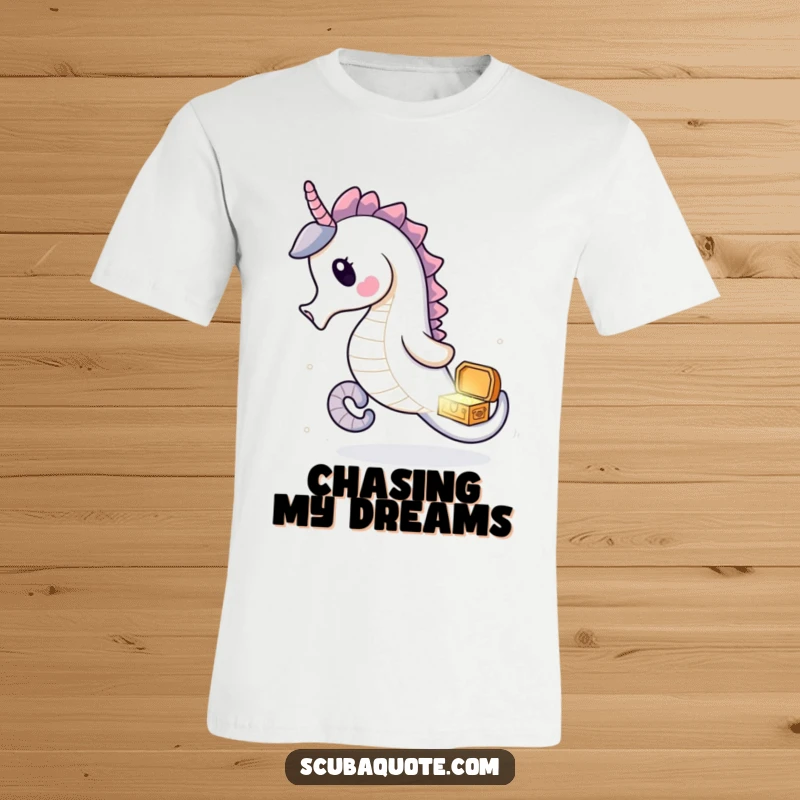 Funny seahorse t-shirt showing a delighted seahorse chasing a tiny, sparkling treasure chest, ideal for casual wear.